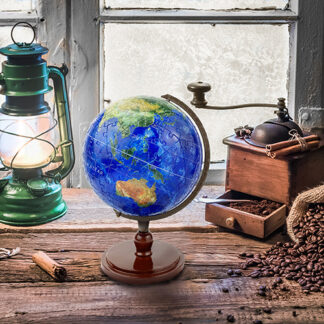 A Resplendent Earth Puzzle Globe with coffee beans and a globe.