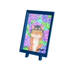 A blue frame with a painting of Seashell on the Beach on it.