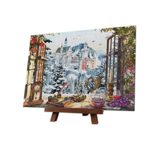 A puzzle painting of The Fairytale Castle on an easel.