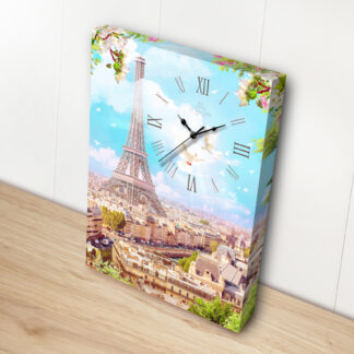 A Springtime in Paris with clock with a picture of the Eiffel Tower.