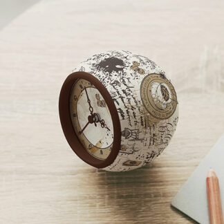 A Starry Night Over the Rhone, 1888 Puzzle Clock on a table.