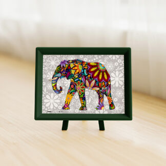 A colorful Forever blue puzzle in a frame on a table.