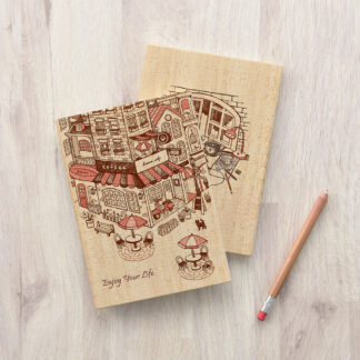 A Love Corner Puzzle Cover notebook with a city drawing and pencil.